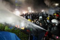 American police officers enter to ensure the safety of university campuses